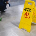 Wet floor caution sign on floor